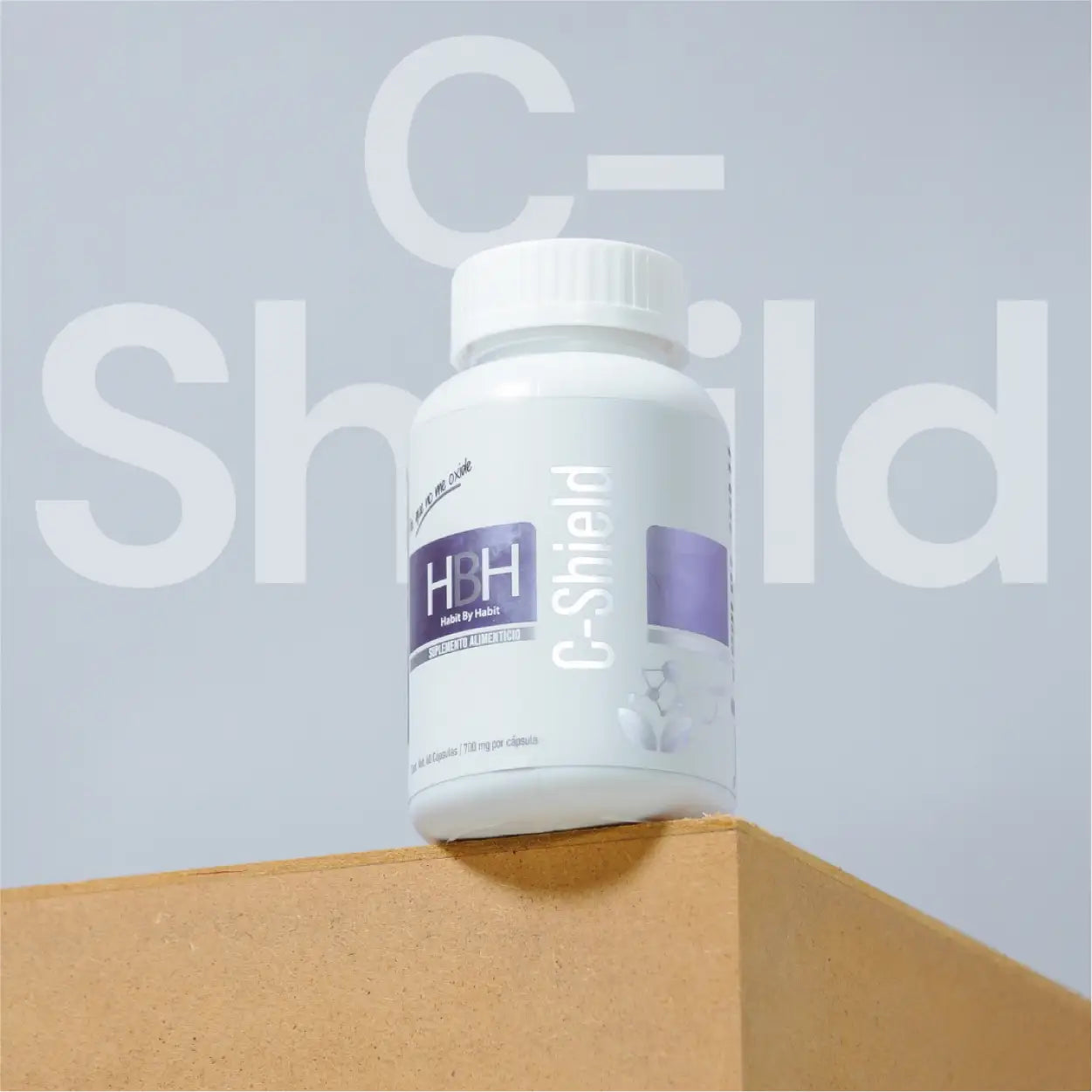 Frasco real de C-Shield en presentación individual sobre fondo neutro
